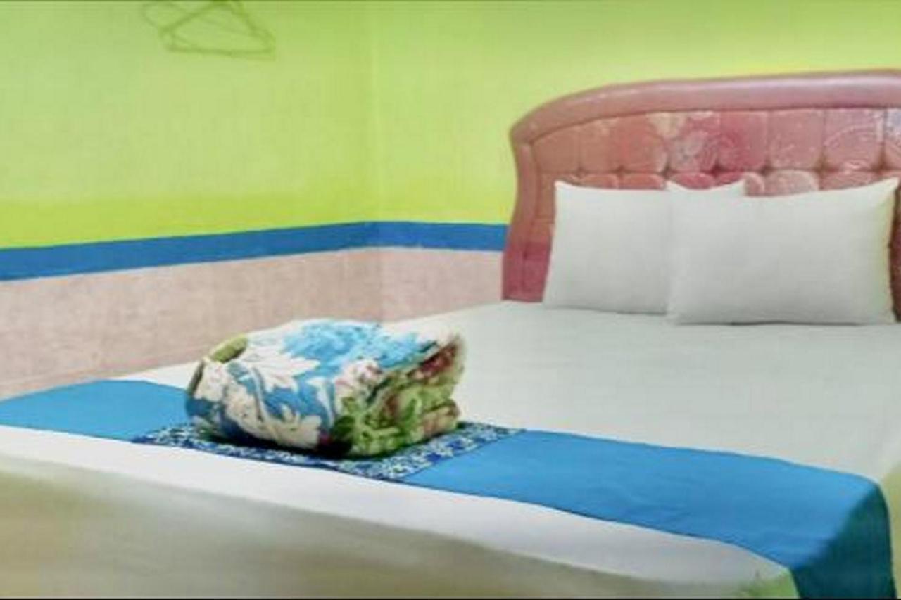 Hotel Indah Grogot Syariah Mitra Reddoorz Tanah Grogot Esterno foto